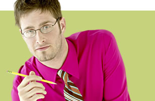 Photo of man with glasses and pencil.